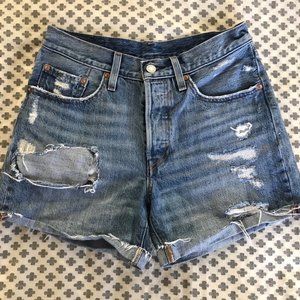 Light blue distressed Levi's jean shorts